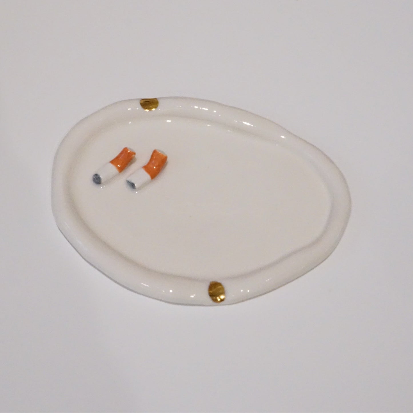 Ashtray with Cigarettes in White Porcelain by Hania Jneid