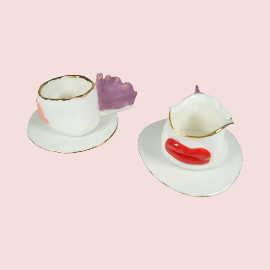 Taza de espresso con platos Lips